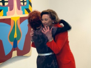Judy Chicago embraced by the Queen of Norway at her exhibition at Oslo Kunstforening